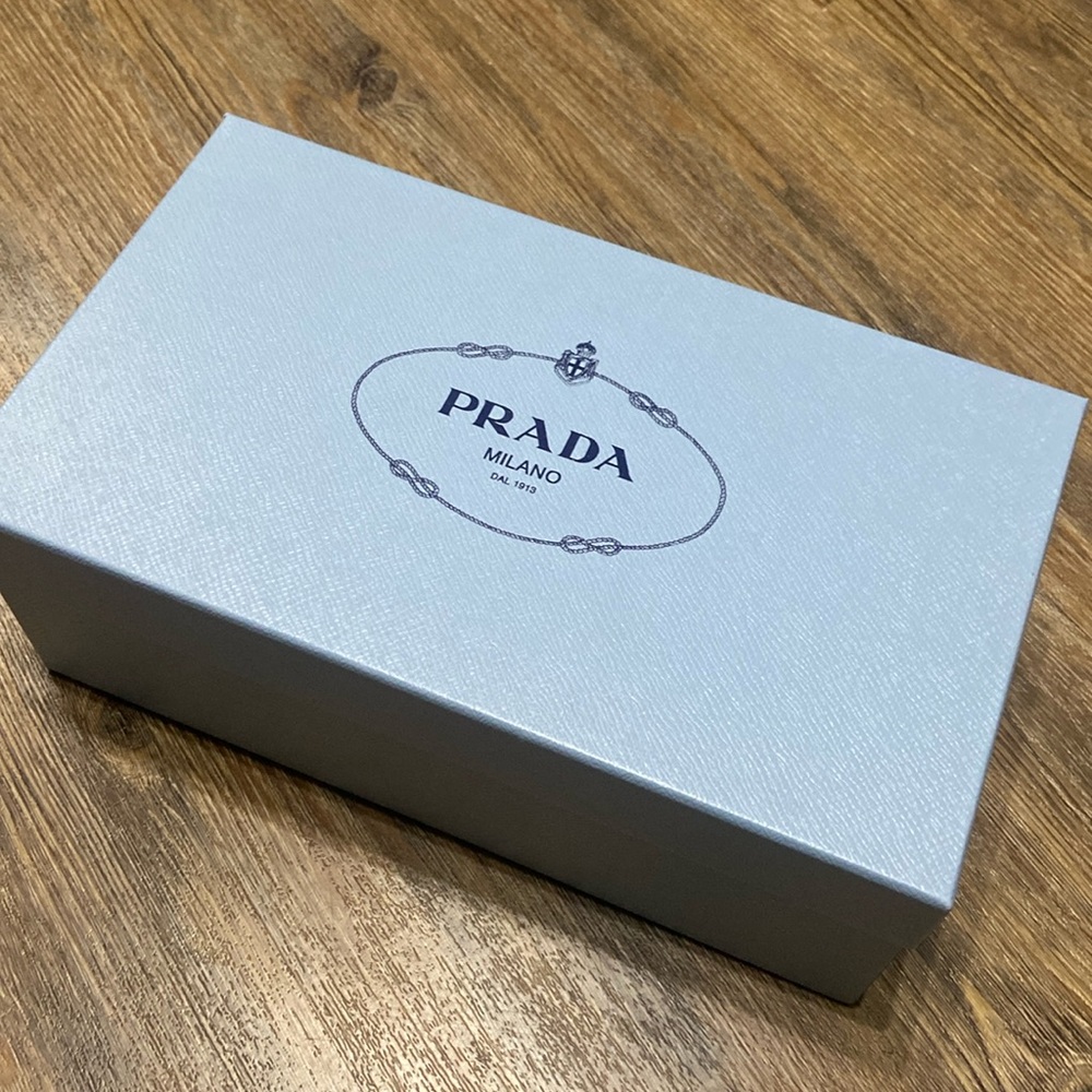 Prada shoe box and a pair of shoe bags